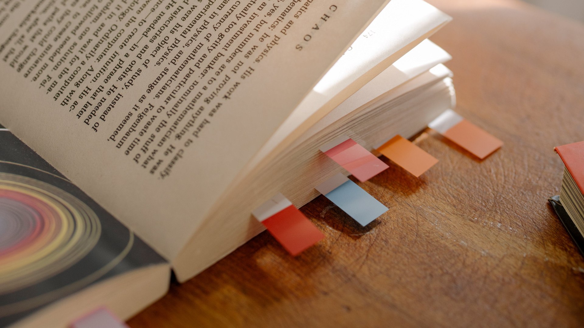 A book with some bookmarks in it