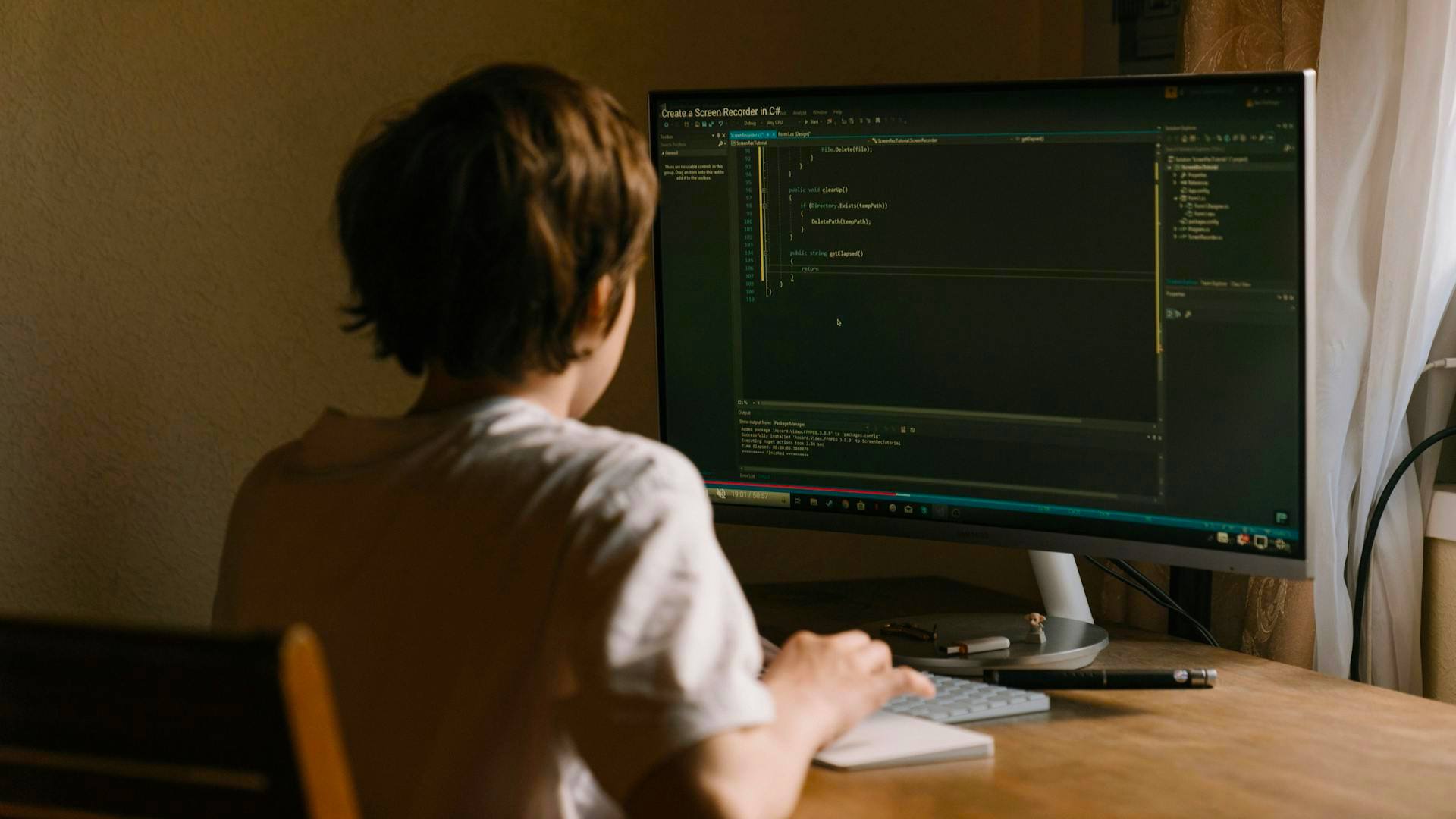A child programming on a computer